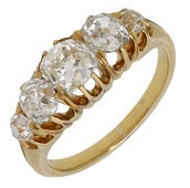 A diamond five stone ring, set with a graduated row of old brilliant-cut diamonds, partial maker’s mark, total...