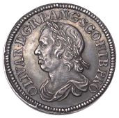 Oliver Cromwell, Shilling, 1658, by J.S. Tanner [struck in 1738], in silver, on a thick flan, no berries on wreath,...