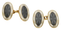 A pair of 9ct gold and enamel cufflinks by Alabaster & Wilson, 1993, the oval panels with grey guilloché enamel...