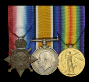 Three: Warrant Electrician E. G. Goad, Royal Navy, one of six officers killed in action in H.M.S. Lion at Jutland,...