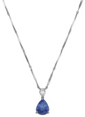 A sapphire and diamond pendant by Hirsh, the pear-shaped sapphire beneath a similarly-cut diamond surmount, weighing...