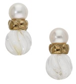 A pair of gem-set earrings by Cassandra Goad, the carved rock crystal boules beneath cultured pearl surmounts, with...