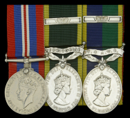 Three: Drum Major G. W. Kerswill, Devonshire Regiment

War Medal 1939-45; Efficiency Medal, E.II.R., 2nd issue,...