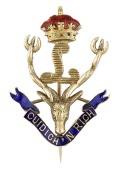 Regimental interest: An enamel Seaforth Highlanders sweetheart brooch, the stag between enamel crown and letter...