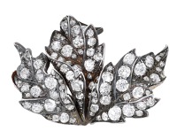 A 19th century diamond brooch, of three-leaf foliate design, set throughout with old brilliant and rose-cut...