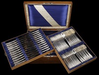 A German late 19th century silver twelve-place canteen, comprising table knives and forks, dessert spoons and forks,...