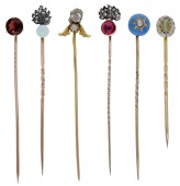 Six antique stickpins, comprising various diamond and gem-set examples including a chrysoberyl and diamond cluster...