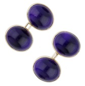 A pair of 9ct gold and amethyst cufflinks, the amethyst cabochons collet-set to chain connectors, maker’s mark...