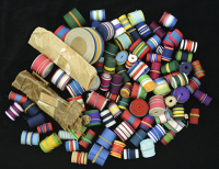 Riband: A partial roll of original Victory Medal riband, approximately 12.5m in total length; together with small...