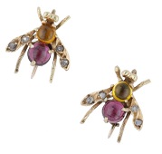 A pair of gem-set insect brooches, each with an orange gemstone cabochon thorax, garnet cabochon abdomen and diamond...