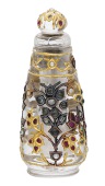 An Indian Mughal style rock crystal scent bottle and stopper, probably 19th century, the flared body overlaid with...
