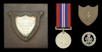 An H.M.S. Courageous Presentation Shield
A small presentation shield, 51mm x 48mm, silver, hallmarks for London...