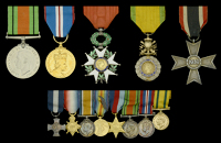 An unattributed mounted group of eight miniature dress medals

Distinguished Service Cross, G.VI.R.; 1914-15 Star;...