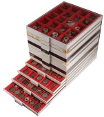 A large quantity of coins and artefacts, principally housed within twelve Lindner stacking trays, generally base...