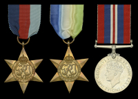 Three: Petty Officer Motor Mechanic F. Hammond, Royal Navy, who was killed in action during the Battle of the...