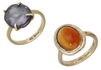 Two gem-set rings by Joanne Repton, the first set with a freshwater cultured pearl of black tint, mounted in 18ct...