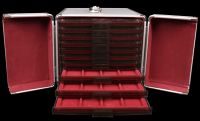 A metal coin cabinet by Leuchtturm, 26 x 32 x 22cm, containing 10 plastic trays to house 200 coins, lock and key...