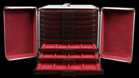 A metal coin cabinet by Leuchtturm, 26 x 32 x 22cm, containing 10 plastic trays to house 200 coins, lock and key...