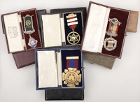 An assorted group of Masonic interest silver medals (8), one with 9ct gold decoration in the form of a scroll, and...