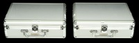 A pair of metal coin cases (2), comprising 12 tray to house a combined total of 144 coins, lock and keys, carrying...