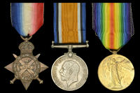 Three: Private J. Blois, The King’s Royal Rifle Corps, who was severely wounded by German artillery fire in the...
