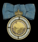Royal National Lifeboat Institution Decoration, small gold medal, 27mm, gold (9ct?) and enamel, the obverse showing...