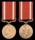A Sea Gallantry Medal awarded to Third Hand E. J. Wells, Mercantile Marine, for his gallantry in rescuing the crew...