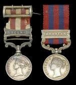 The mounted miniature Indian Mutiny medal worn by Lieutenant William Atkinson, 52nd Light Infantry 
Indian Mutiny...