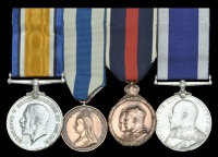 Four: Acting Chief Petty Officer W. Dixon, Royal Navy, who served in H.M.Y. Osborne and was awarded the Meritorious...