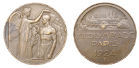 France, Olympic Games, Paris, 1924, a bronze Participant's medal by R.-R.-A. Bénard, winged female standing to...