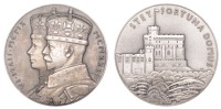 George V, Silver Jubilee, 1935, a silver medal by P. Metcalfe, conjoined crowned busts left, rev. view of Windsor...