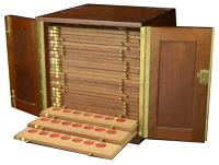 A wooden cabinet by Peter Nichols, 30 x 30 x 31cm, comprising 27 trays, to hold 1,134 coins in 6 x 7 trays, double...