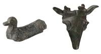 Late Iron Age, c. 1st Century AD, bronze bucranium or bulls head bucket mount, flat underside, two loops at top...